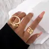 Conjunto Simples Irregular Vazado Curvo Transfronteiriço Europeu e Americano de Quatro Peças com Design Conjunto de Anéis Brilhantes Abertos