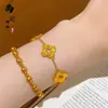 Tienda de Oro Mismo Estilo Arena Dorada Brillante Hueco Hielo Triturado Trébol de Cuatro Hojas Collar Pulsera Alta Retención de Color Flor de Cuatro Hojas Cadena para la Clavícula Venta al por Mayor