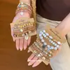Nuevo conjunto de pulseras elásticas de mariposa con cuentas de cerámica acrílica estilo europeo y americano, pulsera de estilo étnico vintage, pulsera de nicho