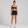 Conjunto de ropa de yoga para mujer transfronterizo con lunares de color contrastante, sujetador deportivo de cuello halter, conjunto de shorts de ciclismo al aire libre para fitness de secado rápido