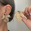 Pendientes de Flor Irregulares Exagerados con Personalidad de Moda Transfronterizos Europeos y Americanos Pendientes Femeninos Pendientes Pendientes