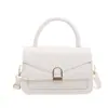 Bolso casual y de moda de alta calidad, nuevo modelo de otoño 2026, bolso cuadrado pequeño simple de color liso, bolso cruzado versátil y elegante