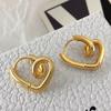 Aretes de Nicho Europeo y Americano de Alta Gama Temperamento Moda Viento Frío Amor Distorsionado Hebilla para la Oreja Aretes Geométricos de Metal Simple