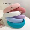 Diadema de caramelo de color macarrón con esponja y ala ancha primavera y verano alta sensación prenda exterior de verano top de calavera todo partido cabeza diadema femenina pelo