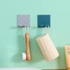 Gancho plegable para enchufe montado en la pared, almacenamiento de enchufes de cocina, adhesivo sin costuras, soporte para teléfono móvil