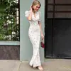 Verano 2026 Europeo y Americano Nuevo Estilo Espalda Descubierta Lazo de Perlas Cuello en V Profundo Vestido Ajustado Moda Estilo Chica Caliente Vestido Largo
