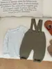 Mono de bebé estilo coreano Ins para hombre y mujer, nuevo mono de punto de color puro para primavera y otoño, ropa para salir