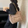 Bolsa de Lona de Grande Capacidade para Mulheres 2025 Novo Estilo Bolsa Tote para Trabalho e Deslocamento Bolsa de Mão Casual para Estudantes Bolsa de Ombro