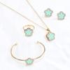 Collar y pulsera con colgante de cuatro piezas de flor de ciruelo de fritillaria negra de doble cara CDD, anillo y trébol de cuatro hojas, suministro de comercio exterior