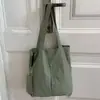 Bolsa feminina de cor sólida estilo japonês transfronteiriça 2026 nova bolsa de ombro transversal de grande capacidade vintage bolsa de ombro simples bolsa artística