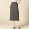 Falda de una pieza para mujer, falda corta con cremallera lateral, cintura elástica en la cadera, falda ajustada al cuerpo, empalme de tela de traje, dobladillo de encaje, falda de temperamento