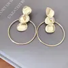 Pendientes Redondos de Hierro Irregulares Exagerados Estilo Europeo y Americano Pendientes de Botón de Personalidad Minimalistas Pendientes de Nicho de Alta Gama para Mujer