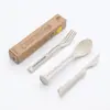 Paja de trigo tres en uno cuchillo y tenedor cuchara portátil para el hogar cuchara de plástico Tenedor trigo juego de cubiertos para comida occidental al por mayor