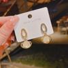 Pendientes colgantes de ojo de gato con aguja de plata S925, populares en Internet, nuevos pendientes de moda, pendientes sencillos y elegantes para mujer, estilo Hong Kong.