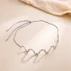 Collar de acero de titanio chapado en oro de lujo ligero y sin decoloración, cadena de clavícula con lazo de moda versátil para mujer, fabricantes