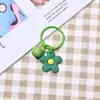 Pequeño regalo estilo coreano Hyun Ya estilo color pegamento suave pequeña flor campana llavero llavero bolso de mujer colgante