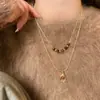 Collar de Corazón con Cuentas de Ojo de Tigre de Doble Capa Estilo Coreano Nuevo Diseño de Nicho Cadena para Clavícula de Lujo Ligero Collar de Moda