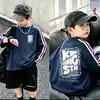Camiseta Base de Manga Larga de Algodón Puro para Niños Guapos, Tallas Mediana y Grande, Nueva Colección Primavera/Otoño 2026, Top Holgado Versátil