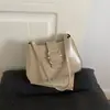 Bolso de hombro tipo baguette brillante nuevo 2026, diseño de hebilla simple y elegante, bolso de hombro de color liso, estilo coreano, versátil y elegante para ir al trabajo