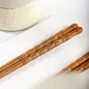Palillos de madera maciza japoneses creativos de uña de tortuga puntiagudos palillos de sushi tienda vajilla de madera palillos de madera antideslizantes venta al por mayor