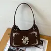 Bolsa de mão vintage requintada Ruien para mulheres, nova coleção de outono 2026, bolsa transversal estilosa com alto apelo estético, bolsa tote pequena da moda