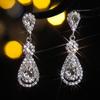 Machika - Pendientes largos de gota de agua de alta gama, exquisitos, de moda, con brillantes diamantes de imitación, elegantes y modernos.