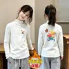 Camiseta de Manga Larga para Niña Otoño/Invierno 2026 Nuevo Estilo Niña Pequeña Térmica Polar Cepillado Capa Interior Volantes Casual Camiseta Base