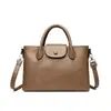Bolso de mano más vendido transfronterizo, bolso de mujer, nuevo estilo 2026, bandolera retro versátil, bolsa tote de gran capacidad para mamás