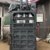 Máquina de empaque hidráulica de cuatro puertas hecha a medida para ropa, juguetes, textiles, redes de pesca, película, etc., para compresión y empaque
