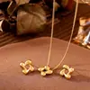 Rueda de la fortuna minimalista flores giratorias collar de acero inoxidable pendientes conjunto joyería exquisita de nicho temperamento en stock venta al por mayor
