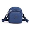 Mini bolso vertical para teléfono móvil para mujer, bolso de hombro oblicuo de tela Oxford de moda para niña, bolso cruzado pequeño multicapa, 2022