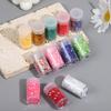 Estrellas de lentejuelas de cinco puntas de celebridad en línea transfronterizas, lentejuelas de estrella láser multicolor, paquete de 4 g, decoraciones de lentejuelas para uñas DIY