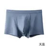 Roupa Íntima Masculina 100% Algodão Cueca Boxer Masculina de Cintura Média Lisa Sem Costura com Parte Íntima Antibacteriana de Verão Absorvente de Suor Respirável Calça Masculina Four-Corner