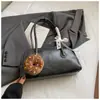 Bolso de Hombro Retro Simple de Gama Alta para Mujer 2026 Nuevo Versátil Tipo Bolso de Bolos de Moda