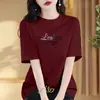 Camiseta de algodón puro de manga corta con cuello redondo para mujer 2026, holgada y chic, nicho, talla grande, adelgazante, top de manga corta estampado, moderno