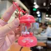 Llavero de Exprimidor de Dibujos Animados Colgante de Mini Exprimidor Divertido Juguete para Niños Colgante para Mochila Escolar de Estudiante Máquina de Garra