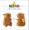 Comercio exterior ocho muñeca capuleto rosa peluche capibara muñeco peluche cobaya de agua fabricantes de máquinas de garra al por mayor
