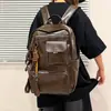 Mochila de viaje versátil de gran capacidad, estilo casual, nueva, para hombres y mujeres, con bolsillos, adecuada para ir al trabajo, mochila funcional 2026