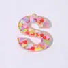 Llavero de Resina con Lentejuelas Letra Inglesa A-Z Mariposa Rosa Colgante de Borla Decoración para Mochila para Mujer Más Vendido Transfronterizo