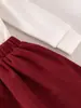 2026 Venda Quente Conjunto de Duas Peças para Bebê Menina: Top com Flor Tridimensional + Saia Plissada Curta em Linha A
