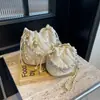 Bolso Cubo Mini Exquisito Súper Popular para Mujer, Nuevo Modelo de Verano 2026, Bolso Cruzado de Cadena de Nicho de Gama Alta