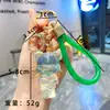 Llavero de Oso de Resina Transparente Blanco con Hojuelas Doradas Dibujo Animado Muñeca de Resina con Polvo Dorado Colgante Lindo para Bolso Pequeño Regalo