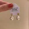 Pendientes de aro grandes geométricos con acabado cepillado, pendientes exagerados de lujo ligero de alta gama, pendientes elegantes de nicho de lujo ligero metálicos mate
