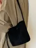 Bolso tipo cubo minimalista estilo coreano Shuai Mi Jia, nuevo modelo otoño 2026, bolso de hombro de alto valor estético, bolso de hombro único y moderno