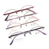 Montura de gafas de medio aro ovalada simple retro de titanio puro al por mayor para cara pequeña miopía montura de gafas de placa de montura pequeña para mujer