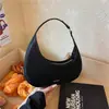 Bolso de mano tipo dumpling de diseño de nicho transfronterizo, nuevo modelo de verano 2026, bolso de axila versátil de alta gama, bolso de mano y bolso cruzado a la moda