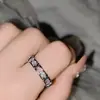 Anillo de Gema en Polvo Rosa Cruz Versa Brillante Chapado en Oro de 18K Ocho Corazones y Ocho Flechas Circonita Diamante Súper Brillante Pendientes X