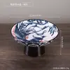 Plato de postre pintado en azul y blanco con pie alto, plato para frutos secos y pasteles de salón de té, plato pequeño de cerámica para frutas para uso doméstico, plato de té y postre para ofrendas budistas