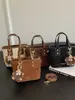 Bolso de hombro transfronterizo nuevo y moderno para el otoño de 2026, bolso cruzado de moda y versátil, elegante y práctico para ir al trabajo, bolso tipo cubo tote de alta calidad
