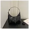 Bolso de Axila de Nicho para Mujer 2026 Nuevo Primavera Gama Alta Lujo Ligero Versátil para el Viaje Diario Bolso de Hombro Único Cruzado